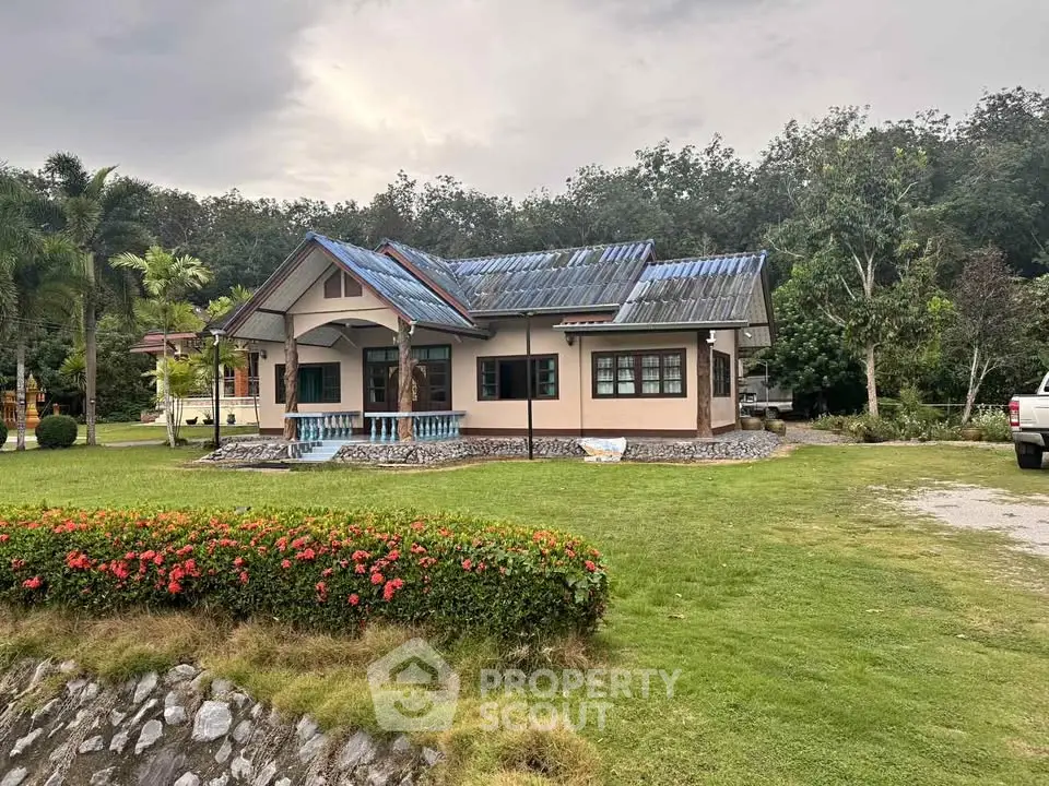 Charming countryside house with lush garden and scenic surroundings