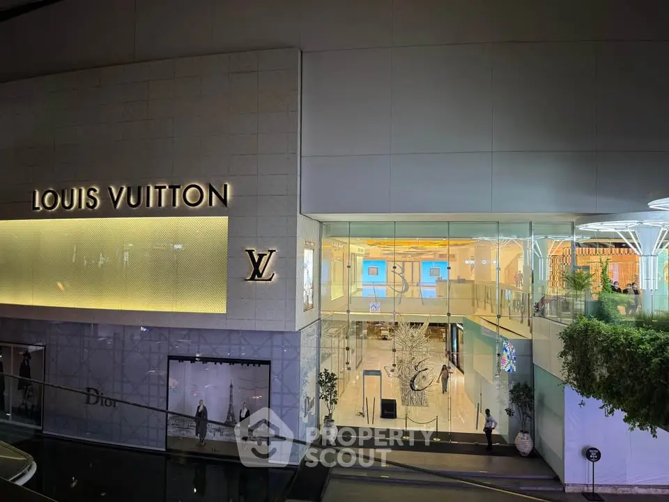 Luxurious Louis Vuitton store exterior with elegant glass facade and modern design.