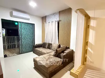 Modern living room with cozy sectional sofa and stylish decor