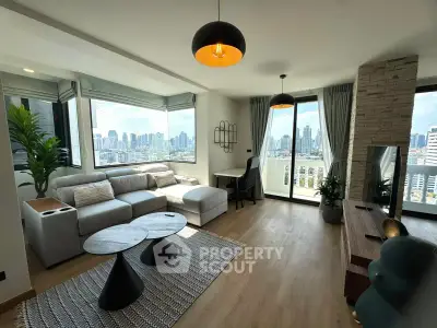 Modern living room with panoramic city views and stylish decor