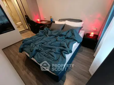 Cozy bedroom with modern decor and ambient lighting