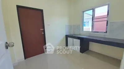 Modern kitchen with sleek countertops and ample natural light