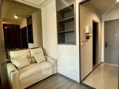 Modern apartment entrance with cozy seating and sleek design