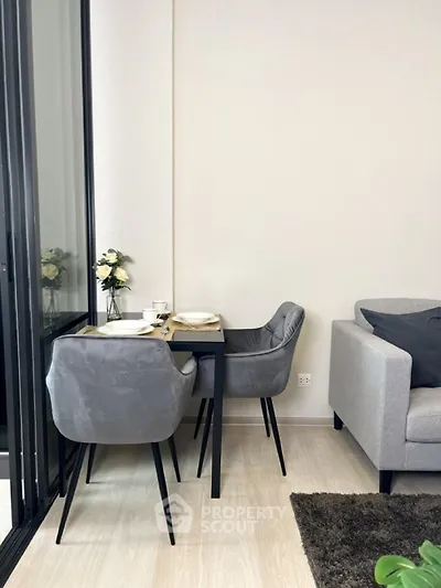 Modern living room with stylish dining area and cozy seating