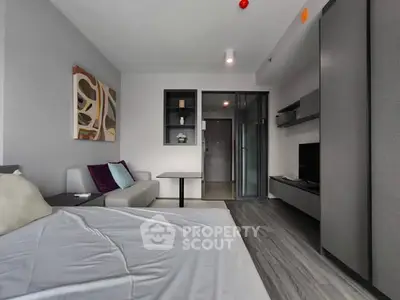 Modern studio apartment with sleek furnishings and stylish decor