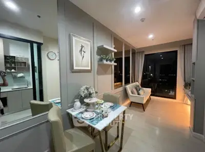 Modern living room with elegant dining area and city view, perfect for urban living.