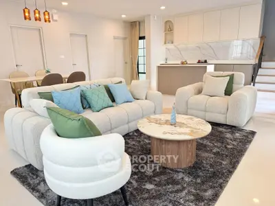 Luxurious modern living room with plush sofas and elegant decor