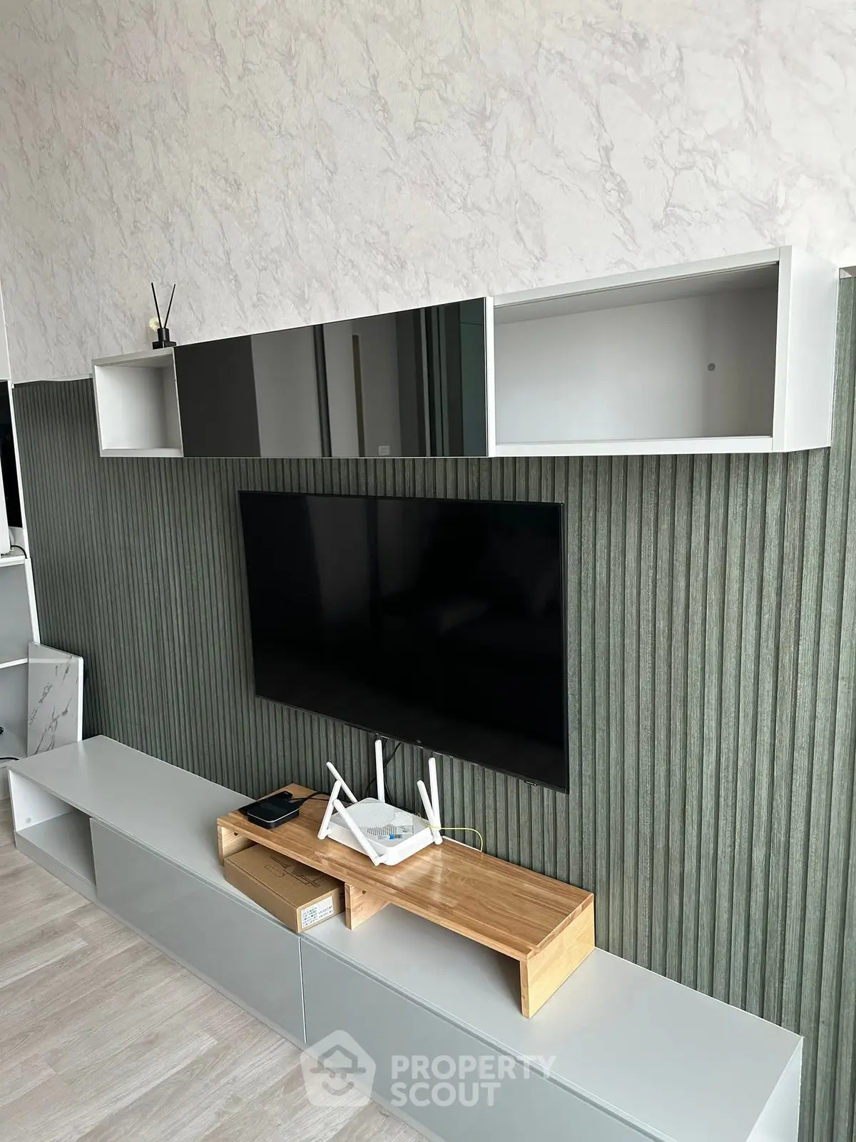 Modern living room with sleek TV unit and stylish decor