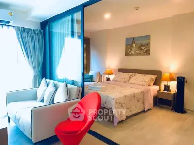 Modern bedroom with glass partition and stylish decor in cozy apartment