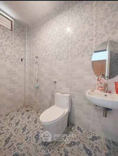 Modern bathroom with stylish tiles and sleek fixtures