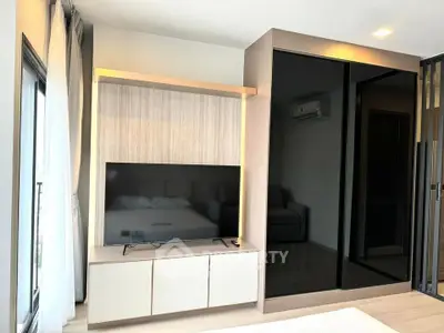 Modern living room with sleek TV unit and stylish storage solutions