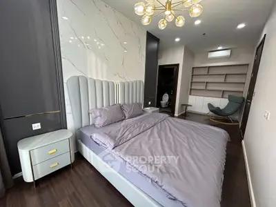 Luxurious modern bedroom with elegant decor and stylish furniture, perfect for relaxation and comfort.