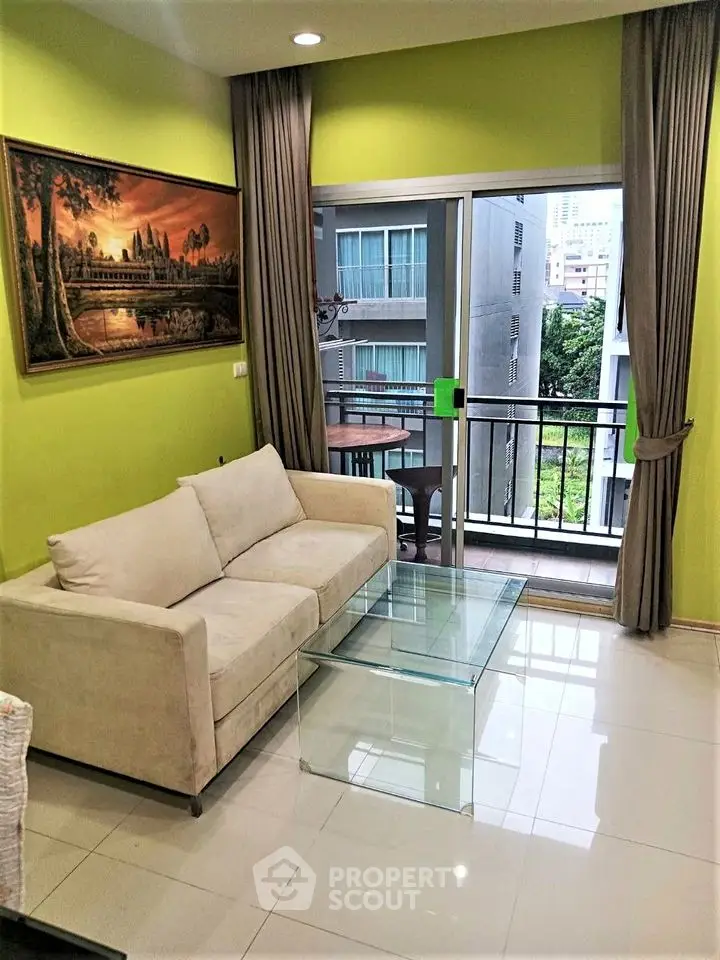 Cozy living room with modern decor and balcony view in urban apartment