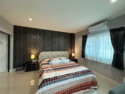 Modern bedroom with stylish decor and cozy ambiance