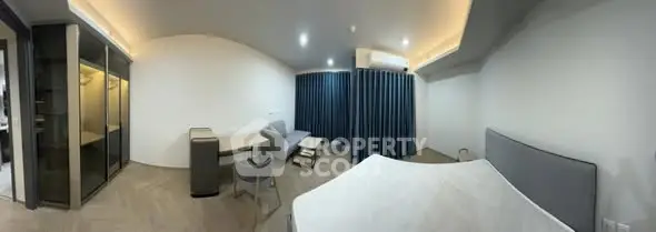 Modern bedroom with sleek design and ample storage space