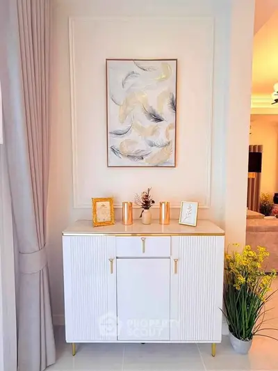 Elegant interior with stylish cabinet and decor in modern living space