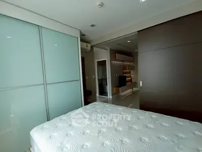 Modern bedroom with sleek sliding doors and stylish decor