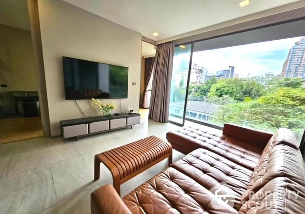 Luxurious living room with modern leather sofa and stunning city view