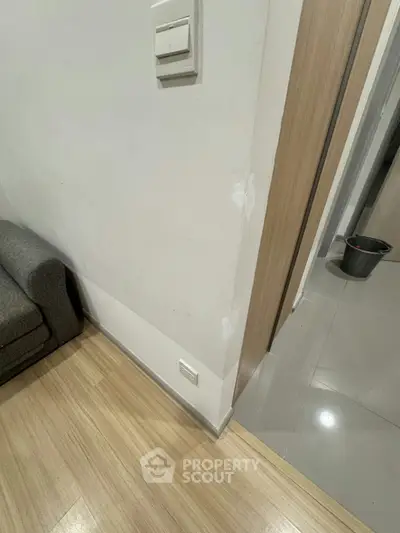 Modern apartment interior with wooden flooring and sleek design