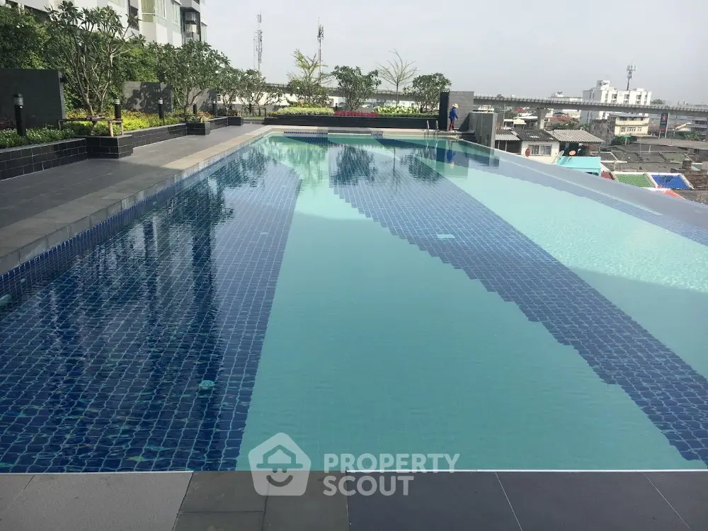 Luxurious rooftop infinity pool with stunning city views and modern design.