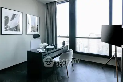 Modern study room with large windows and city view, featuring sleek desk and stylish decor.