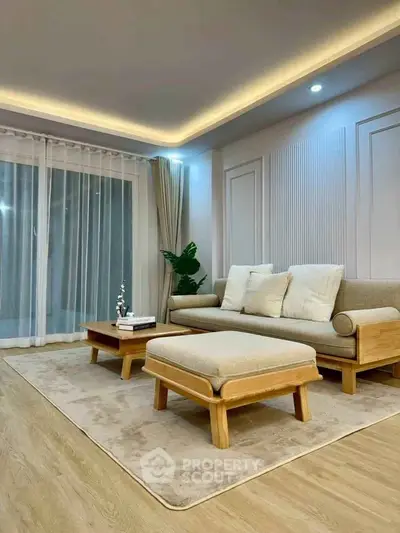 Modern living room with elegant wooden furniture and soft lighting