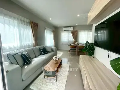 Modern living room with elegant decor and natural light