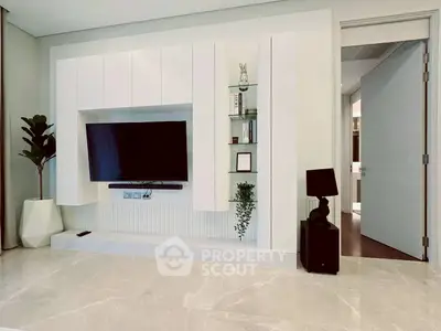 Modern living room with sleek TV setup and stylish decor