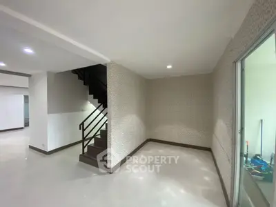 Spacious modern interior with staircase and elegant design