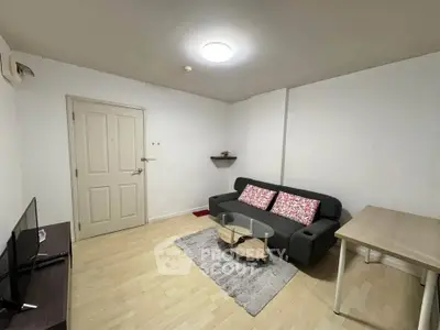 Cozy living room with modern decor and comfortable seating