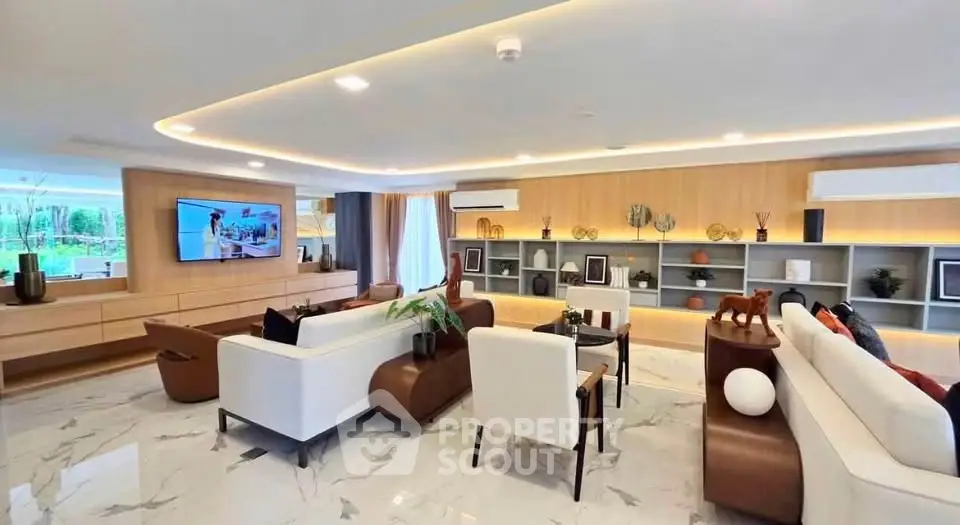 Luxurious modern living room with elegant furniture and stylish decor, perfect for relaxation and entertainment.