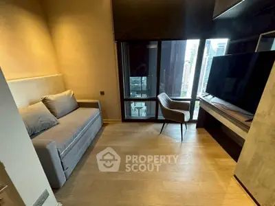 Modern living room with city view, cozy sofa, and sleek TV setup.