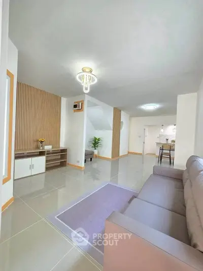 Spacious modern living room with elegant decor and open layout