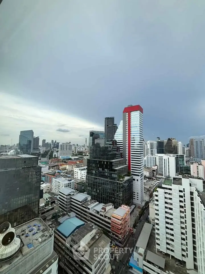 Stunning cityscape view from high-rise building showcasing modern architecture and skyline.