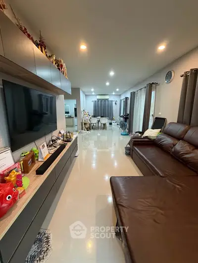 Spacious modern living room with sleek furniture and open layout