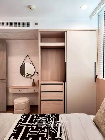 Modern bedroom with stylish wardrobe and elegant decor