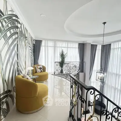 Luxurious interior with elegant staircase and stylish seating area, featuring floor-to-ceiling windows and modern decor.