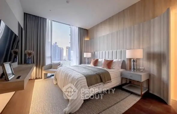 Luxurious modern bedroom with city view, elegant decor, and natural light.