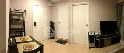 Cozy living room with modern decor and entertainment setup