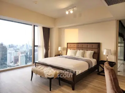 Luxurious bedroom with stunning city view and elegant furnishings