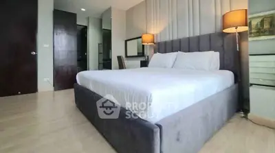 Spacious modern bedroom with elegant decor and cozy lighting