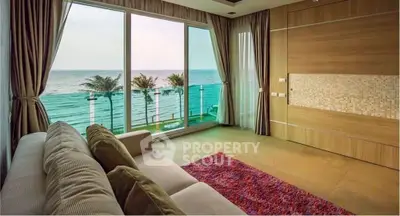 Luxurious living room with stunning ocean view and modern decor