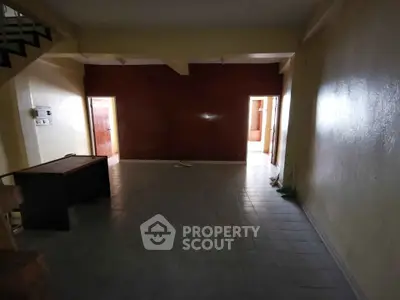 Spacious interior with tiled flooring and open layout, ideal for customization.