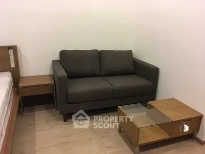 Cozy living room with modern sofa and wooden furniture