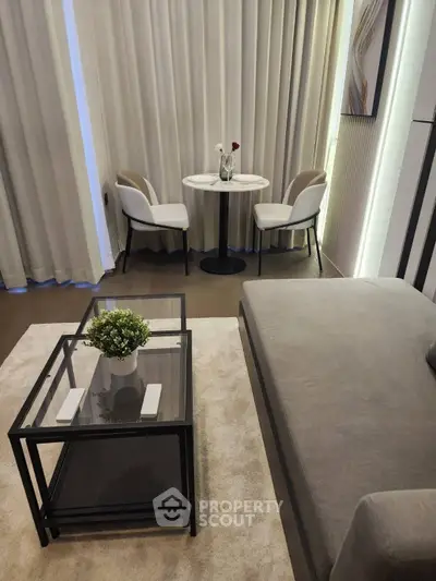 Modern living room with elegant decor and cozy seating area