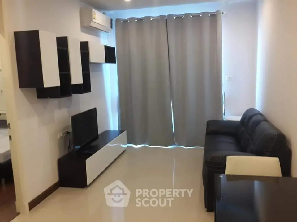 Modern living room with sleek furniture and natural light