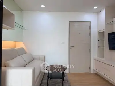Modern living room with cozy sofa and sleek design