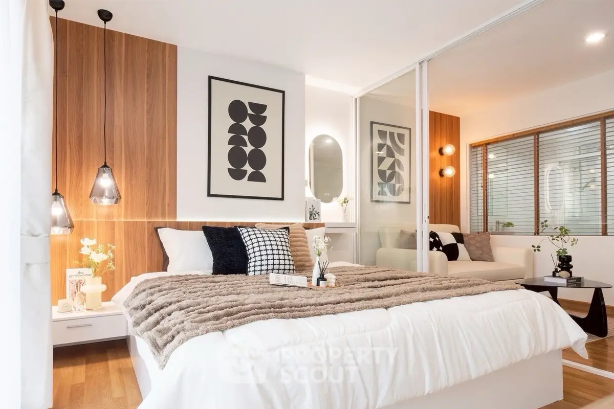 Modern bedroom with cozy decor and stylish lighting