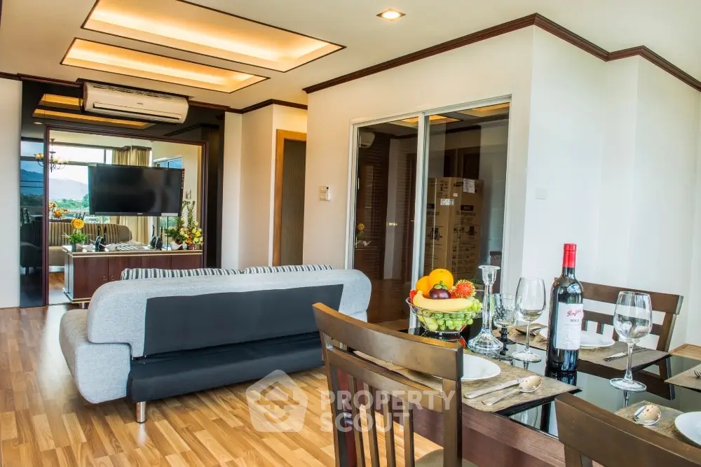 Modern open-plan living and dining area with stylish decor and natural light