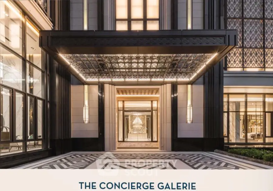 Luxurious building entrance with elegant lighting and modern architectural design.